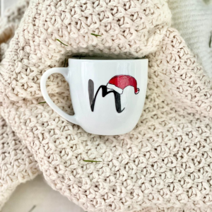 Mikołajkowy kubek z wybraną literą